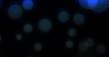 Çok renkli Noel arkaplanı Bokeh ile birlikte yüzüyor, mutlu noeller.