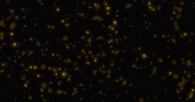 Noel altın ışıltılı arka plan Bokeh ile yüzüyor, altın bayram mutlu yeni yıl şenliği