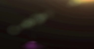 Çok renkli mavi sızıntılar ışıltılı Noel arkaplanı Bokeh ile birlikte yüzüyor, mutlu yıllar.