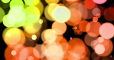 Bokeh 'le yüzen çok renkli, ışıl ışıl Noel arkaplanı, mutlu bayramlar.