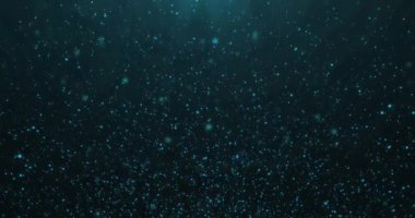 Bokeh 'le birlikte yüzen mavi, parıltılı Noel arkaplanı, altın bayram mutlu yıllar.