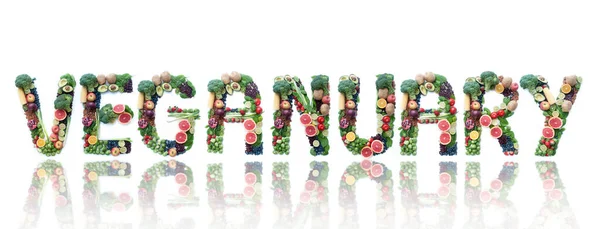 Vegane Wortüberschrift Die Aus Verschiedenen Früchten Gemüse Nüssen Und Hülsenfrüchten lizenzfreie Stockfotos