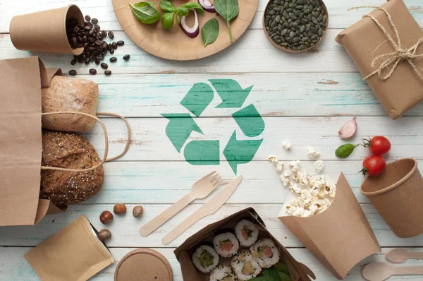 Collection of eco sustainable food packaging with recycling symbol, low carbon green revolution concept