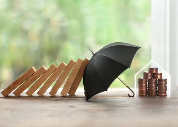 Umbrella Protecting House Coins Domino Collapse Insurance Concept Stock Picture