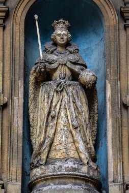 London, UK - March 23rd 2023: Elizabeth I statue, at St. Dunstan in the West Church on Fleet Street in London. It is one of the oldest statues in London - sculpted during Elizabeths lifetime. clipart