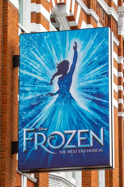 stock image London, UK - March 23rd 2023: Billboard promoting Frozen - The West End Musical, on the exterior of the Theatre Royal Drury Lane in London, UK.