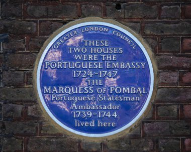 London, UK - January 15th 2024: Plaque on Golden Square in London, marking the former location of the Portuguese Embassy and home of Marquess of Pombal in the 1700s. clipart