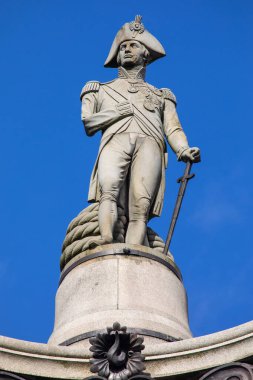 London, UK - February 19th 2024: The sculpture of Vice-Admiral Horatio Nelson ontop of Nelsons Column, located at Trafalgar Square in London, UK. clipart