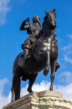 London, UK - February 19th 2024: Statue of King Charles I, at Trafalgar Square in London, UK. The location of the statue is considered to be the central point of London. clipart