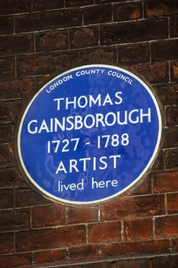 Londra, İngiltere - 19 Şubat 2024: Pall Mall, İngiltere 'de ünlü ressam Thomas Gainsborough' un yaşadığı yeri gösteren mavi bir plaket.