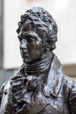 Londra, İngiltere - 19 Şubat 2024: Londra Jermyn Caddesi 'ndeki Beau Brummell heykeli. Brummell, Naip İngiltere 'de önemli bir şahsiyetti ve zamanında erkek modasının hakemlerinden biriydi..