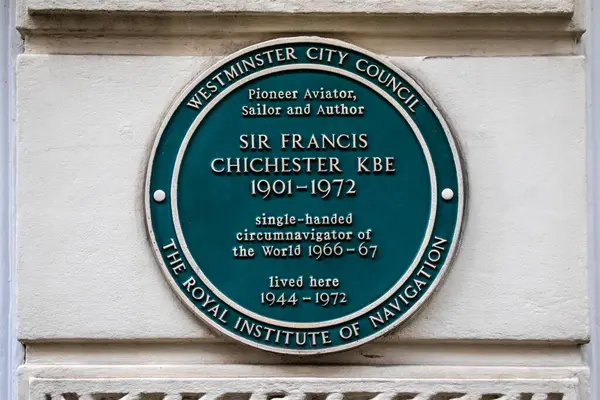 stock image London, UK - February 19th 2024: A plaque on St. James's Place in London, UK, marking the location where pioneer aviator, sailor and author Sir Francis Chichester lived.