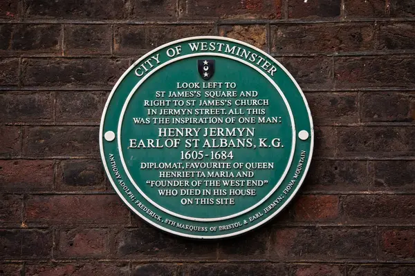 stock image London, UK - February 19th 2024: A plaque on the exterior of  a building on St. James's Square in London, marking the location where Henry Jermyn once lived.