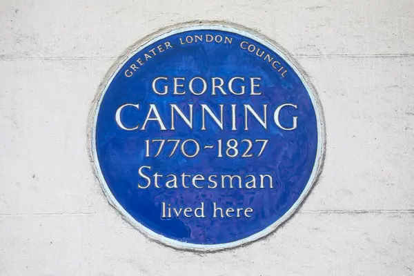 stock image London, UK - February 26th 2024: A blue plaque on Berkeley Square in London, UK, marking the location where former Prime Minister George Canning lived.