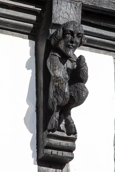 stock image Beautiful wooden carving of a Faun, with a likeness to William Shakespeare on an old timber-framed building in the town of Stratford-Upon-Avon, UK. The town is the birthplace of Shakespeare.