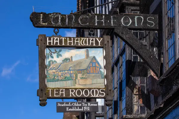 stock image Stratford-Upon-Avon, UK - February 12th 2024:The vintage hanging sign for Hathaway Tea Rooms on the High Street in Stratford-Upon-Avon, UK.