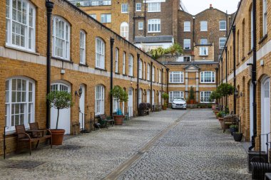 London, UK - March 4th 2024: A view of the pretty Beverston Mews in the Marylebone area of London, UK. clipart