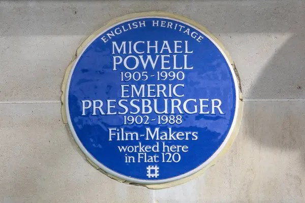 stock image London, UK - March 4th 2024: A blue plaque on Gloucester Place in Marylebone, London, UK, marking where film-makers Michael Powell and Emeric Pressburger worked.