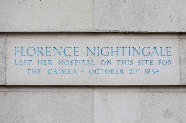 A stone plaque on Harley Street in London, marking the location where Florence Nightingale left for the Crimea in 1854. clipart