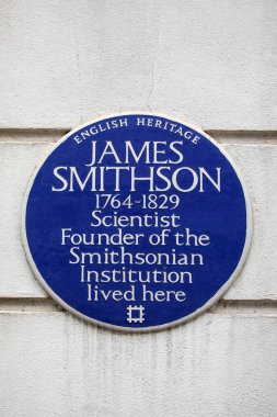 London, UK - March 18th 2024: A blue plaque on Bentinck Street in London, marking where scientist and founder of the Smithsonian Institution - James Smithson lived. clipart