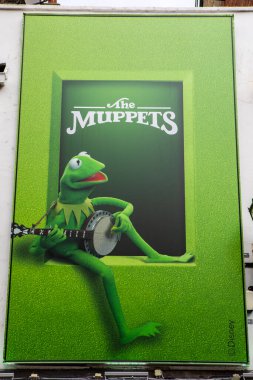 London, UK - March 18th 2024: A billboard on display on South Molton Street in London, promoting The Muppets, clipart
