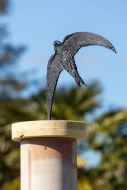 Essex, UK - April 2nd 2023: A Swallow sculpture in the Dry Garden at RHS Hyde Hall in Essex, UK. clipart