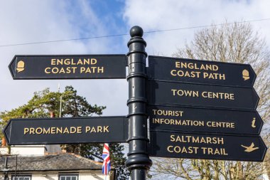 Signposts in the beautiful town of Maldon in Essex, UK, showing directions to local points of interest. clipart