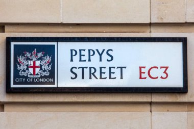 London, UK - April 17th 2023: Street sign for Pepys Street in the City of London, UK. The street is named after Samuel Pepys - historic diarist and naval administrator. clipart