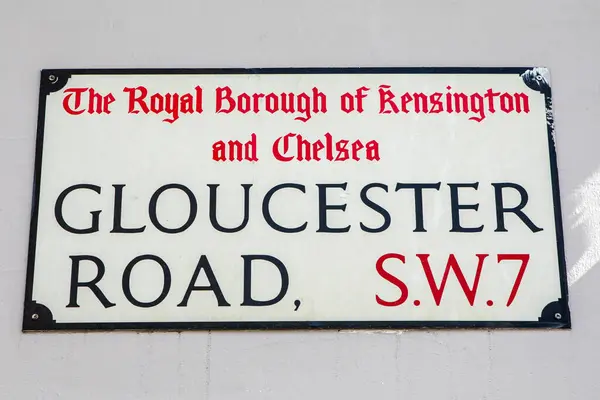 stock image London, UK - March 30th 2023: A street sign for Gloucester Road, located in the Royal Borough of Kensington and Chelsea in London, UK.