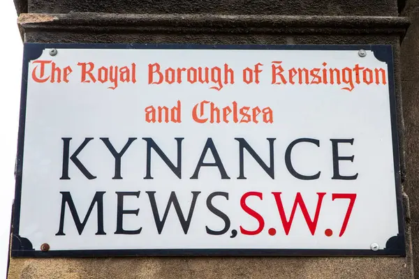 stock image London, UK - March 30th 2023: Close-up of a street sign for Kynance Mews, located in the Royal Borough of Kensington and Chelsea in London, UK.