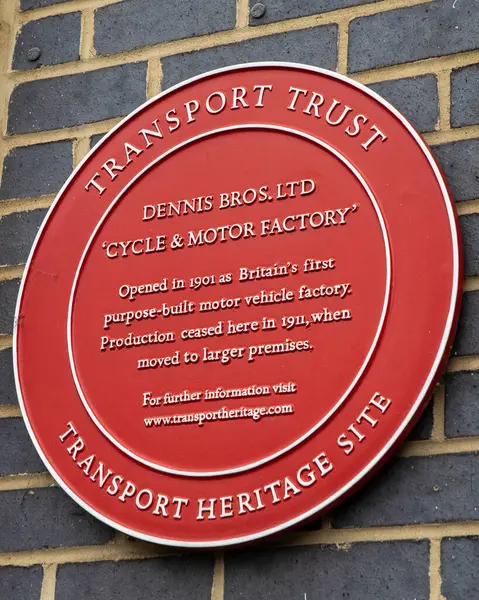 stock image Surrey, UK - April 5th 2023: Plaque marking where the Dennis Bros. Ltd Cycle and Motor Factory was once located from 1901-1911, in the town of Guildford in Surrey, UK.