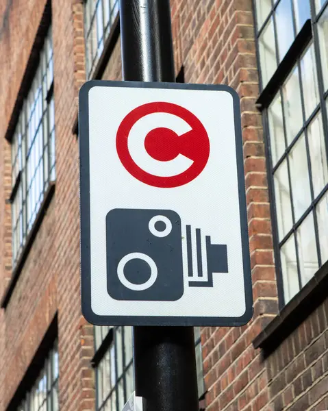 stock image London, UK - March 2nd 2023: A Congestion Charge Camera sign in the City of London, UK.