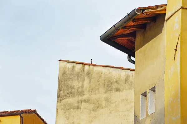 stock image Fragments of the facades of houses on Sapiti Street near square Passera in Florence, Italy. Selective focus