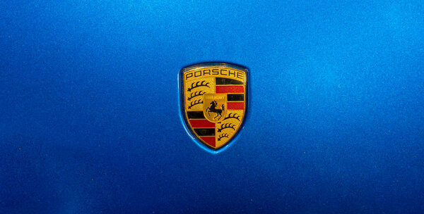 Timisoara,Romania January 17 2024: Porsche logo on a blue car