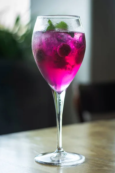 stock image raspberry and red dragon fruit prosecco wine spritzer cocktail