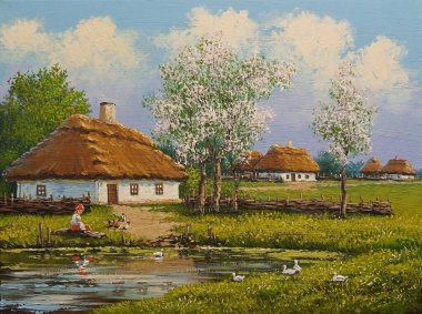 Beautiful rural landscape, old Ukrainian houses surrounded by a blooming garden of flowers, a wooden fence and thatched roofs, traditional house in the old village