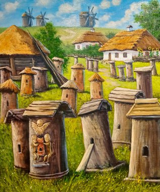 Köyde eski bir ev. Arı kovanlı eski bir arı. Değirmenleri olan bir köyün arka planına karşı arılar için vintage kovanları. Yağlı boyalarla, resimlerle, resimlerle