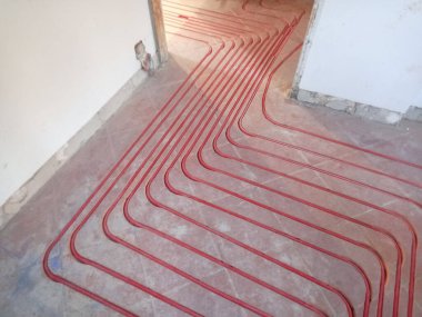 underfloor heating and cooling construction in a building site