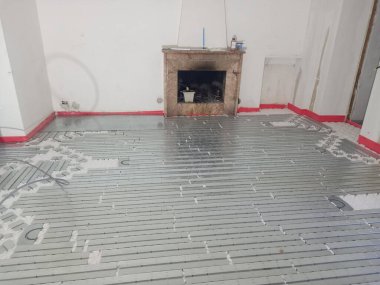 underfloor heating and cooling construction in a building site