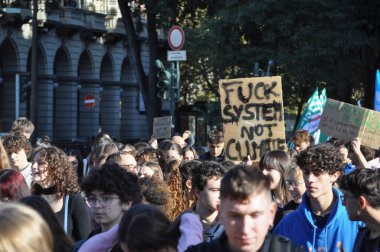 TURIN, ITALY - OCTOBER 11, 2024: Fridays for Future FFF School strike for climate clipart