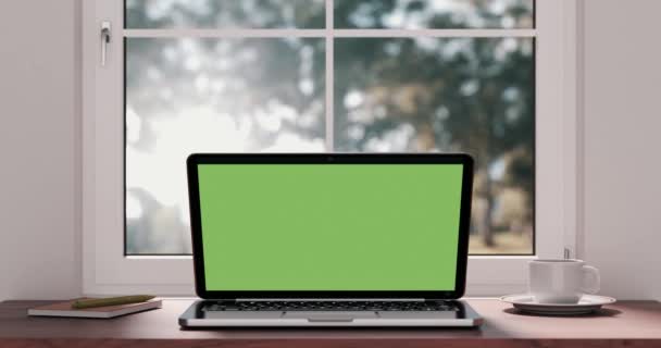 4K分辨率视频 带有空白绿色屏幕平滑放大的现代笔记本电脑软垫或带有阿尔法衬垫的办公室室内软垫 图库视频
