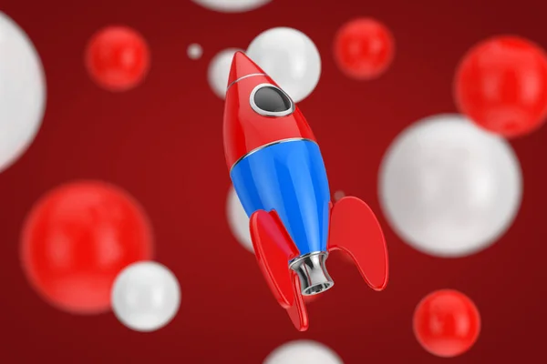 Startup Konzept Childs Toy Rocket Auf Einem Rot Weißen Ballhintergrund — Stockfoto