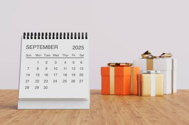 Beyaz Masa Aylık Eylül 2025 İş Takvimi Yakın Hediye Kutuları beyaz arka planda. 3d Hazırlama
