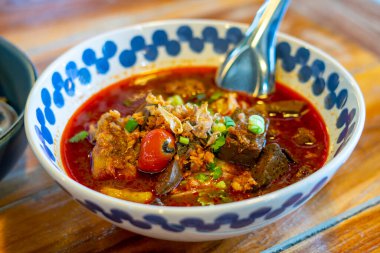 Rice noodles with spicy pork sauce. Local food of Thai in the north of Thailand