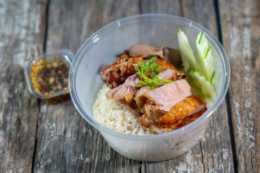 A steamed rice topped with chicken ( Khao Mun Gai ) Thai food