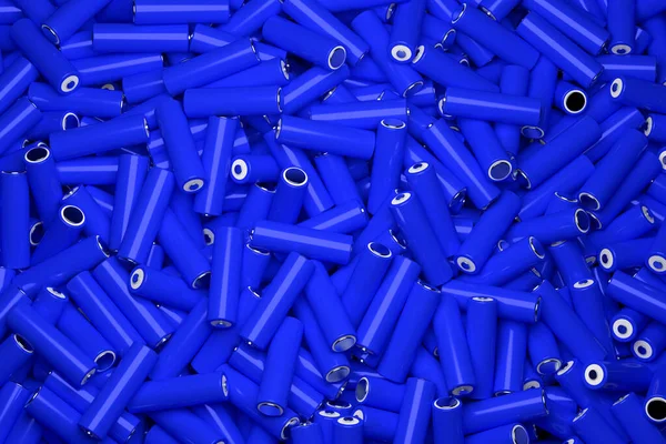 Top view full frame background of many 18650 lithium blue batteries chaotically arranged