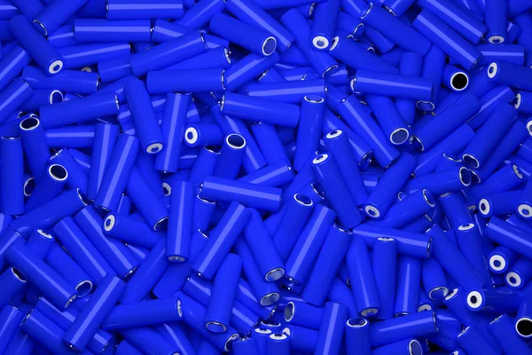 stock image Top view full frame background of many 18650 lithium blue batteries chaotically arranged