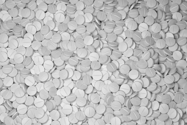 Top full-frame background view of many medicine tablets arranged chaotically. 3d render.