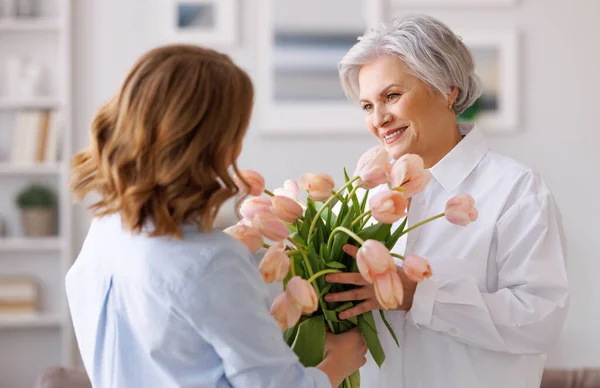 Positive Elegant Elderly Woman Bunch Fresh Tulips Smiling Accepts Gift — Stock Photo, Image