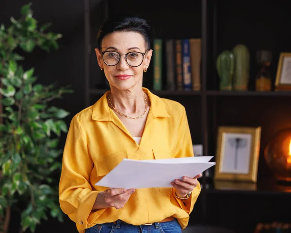 Mature Businesswoman Smart Casual Clothes Glasses Documents Looking Camera Papers — Stock Photo, Image